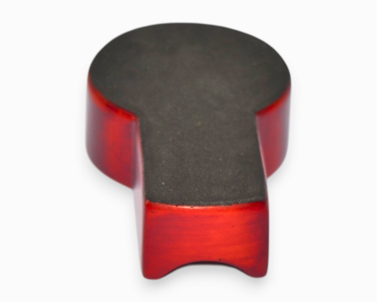 Red and black object on a white background