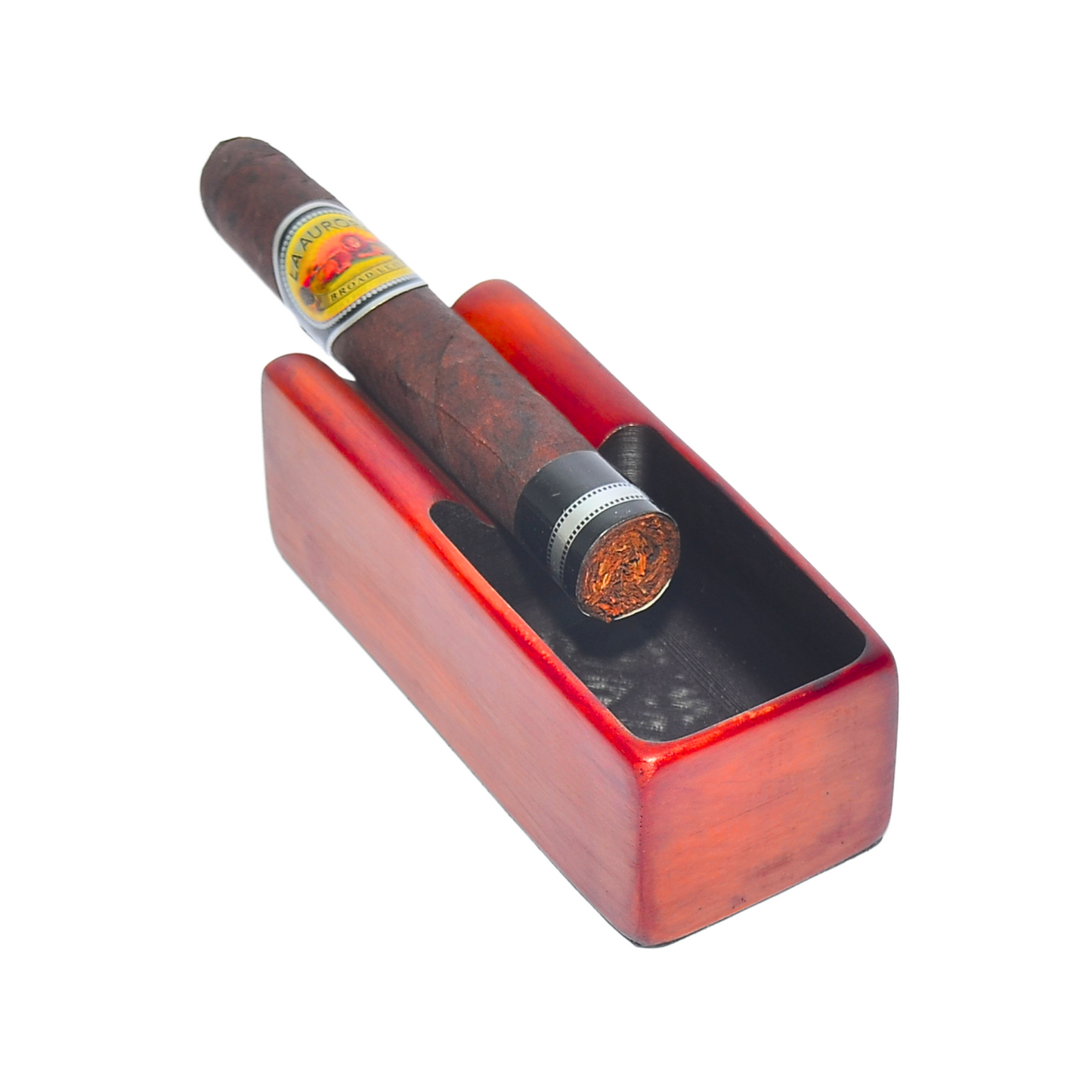 Cigar in a red wooden holder on a white background