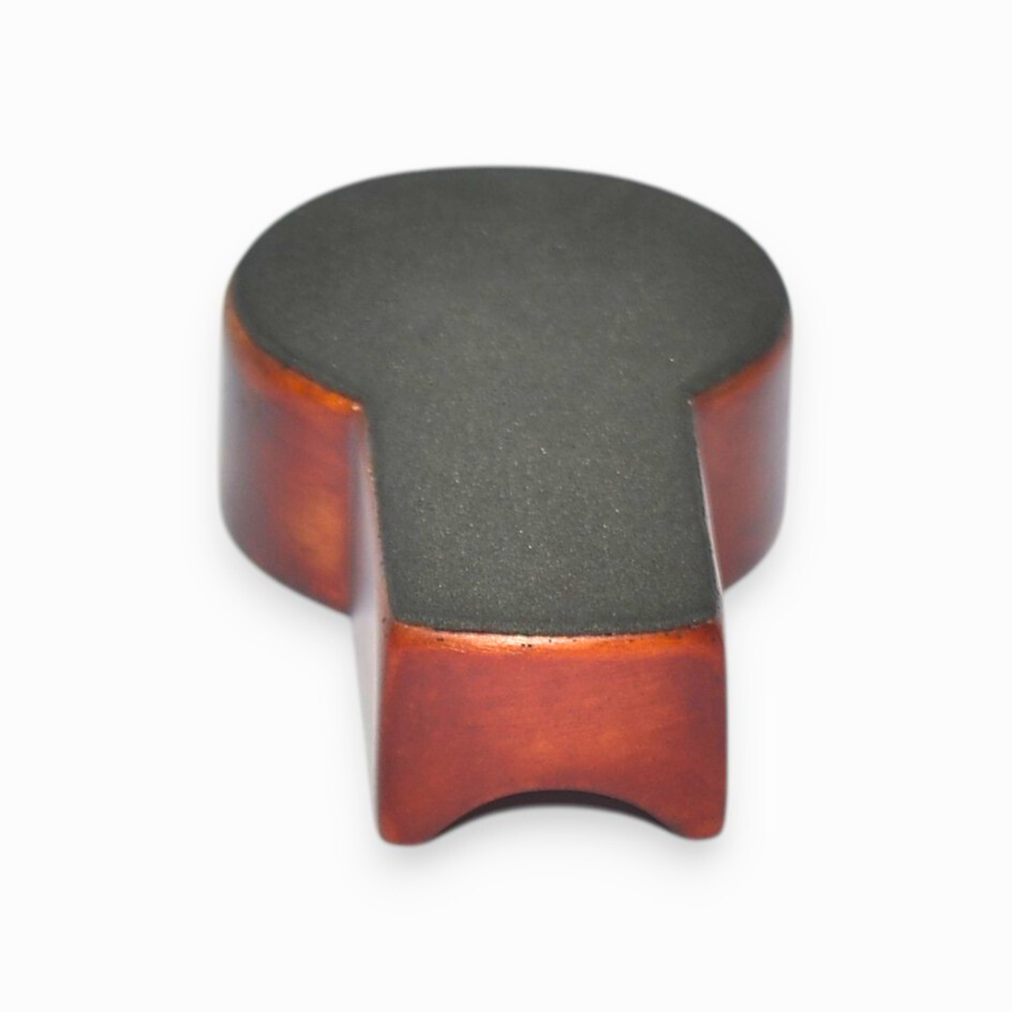 Wooden and black object on a white background