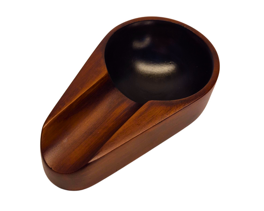 Wooden spoon rest on a white background