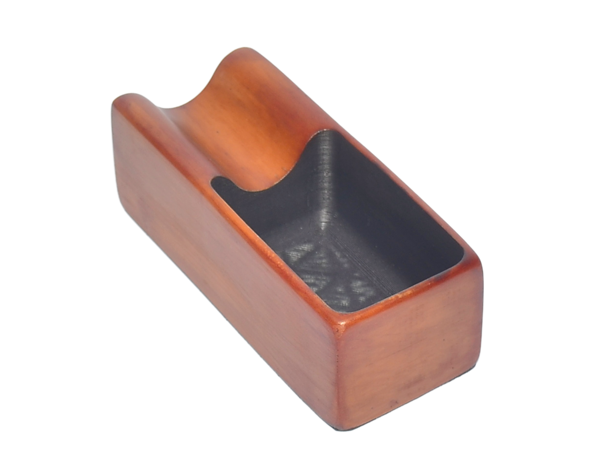 Wooden phone stand with a black interior on a white background