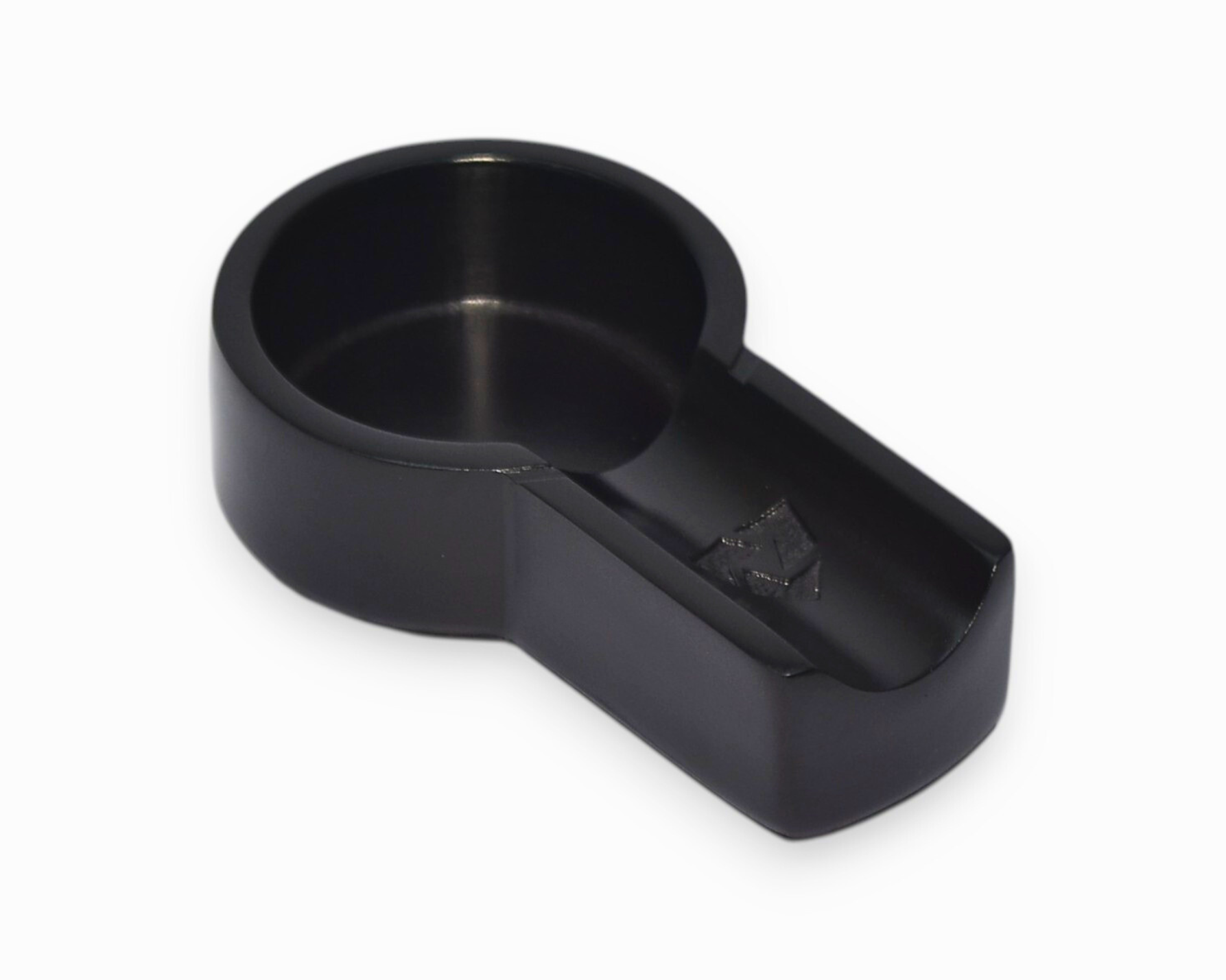 Black plastic cup holder on a white background