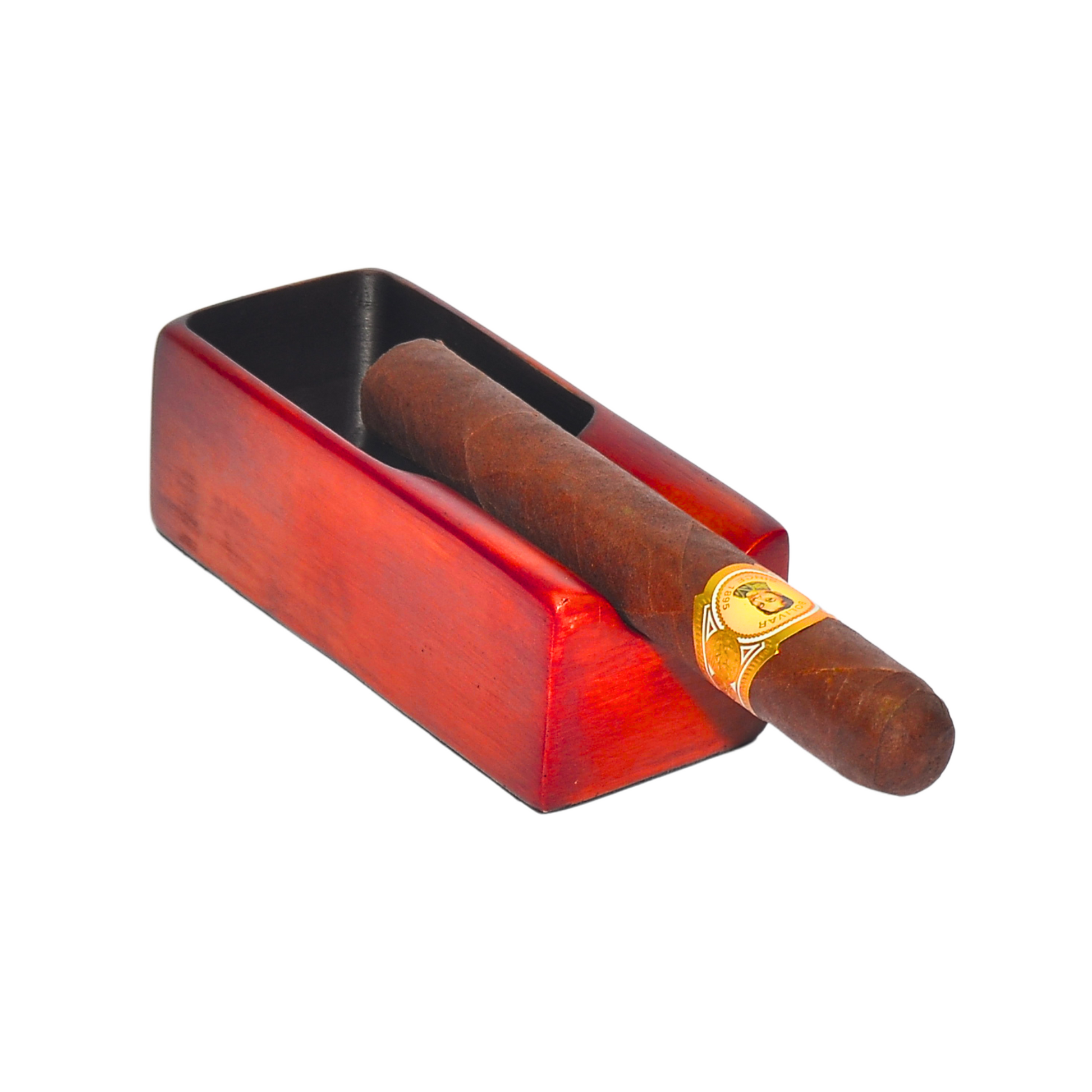 Cigar in a red humidor on a white background