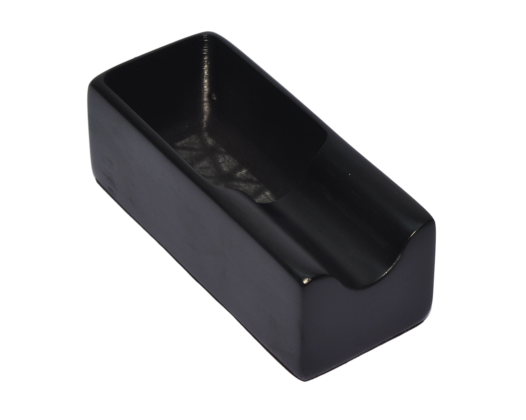 Black rectangular ceramic dish on a white background