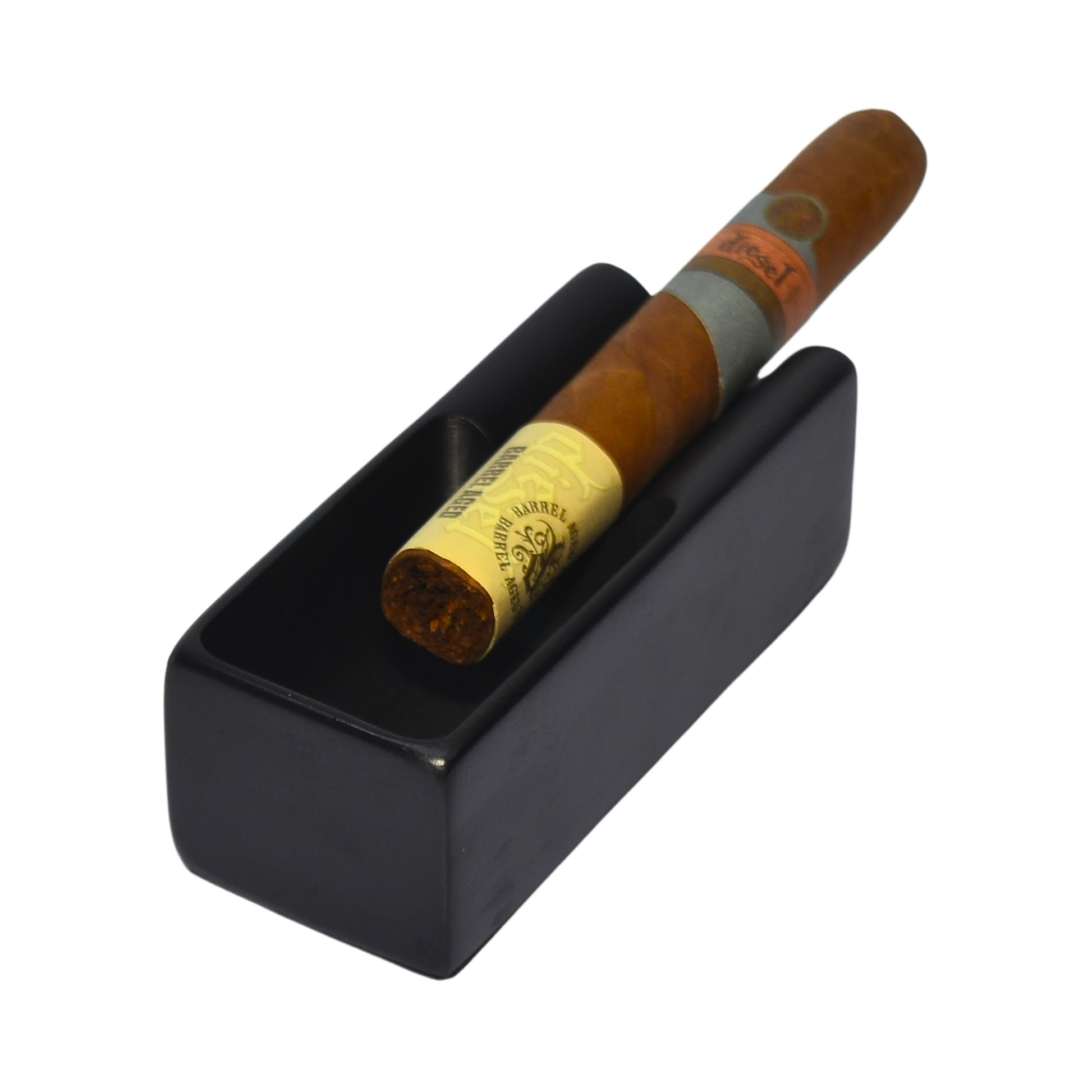 Cigar in a black humidor on a white background