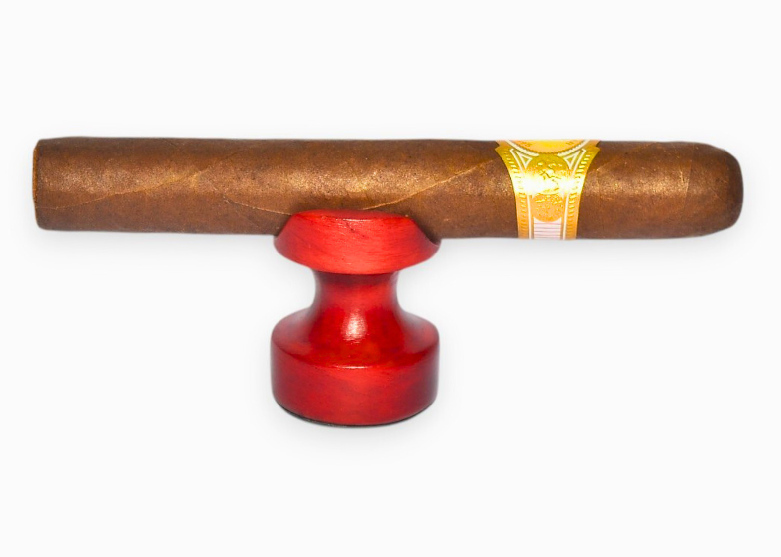 Cigar with a red holder on a white background