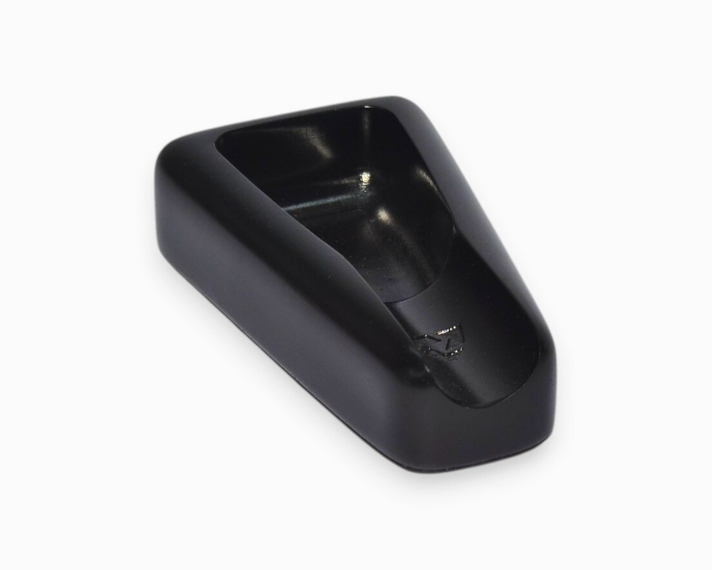 A small triangular cigar ashtray with a single cigar rest (black)