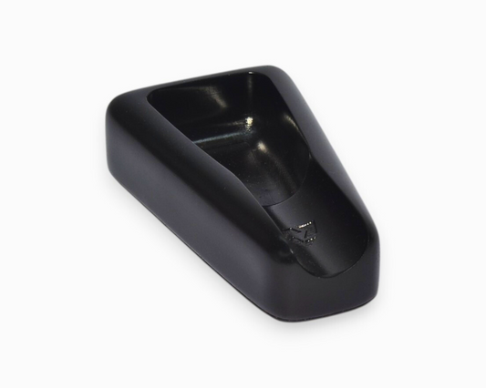 A small triangular cigar ashtray with a single cigar rest (black)