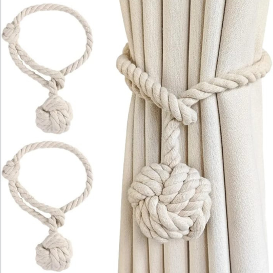Tying curtains with burlap ropes