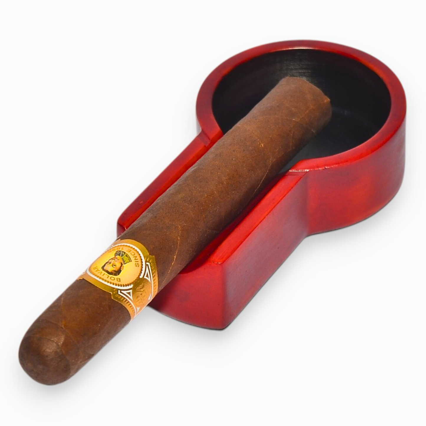 Cigar with a red holder on a white background