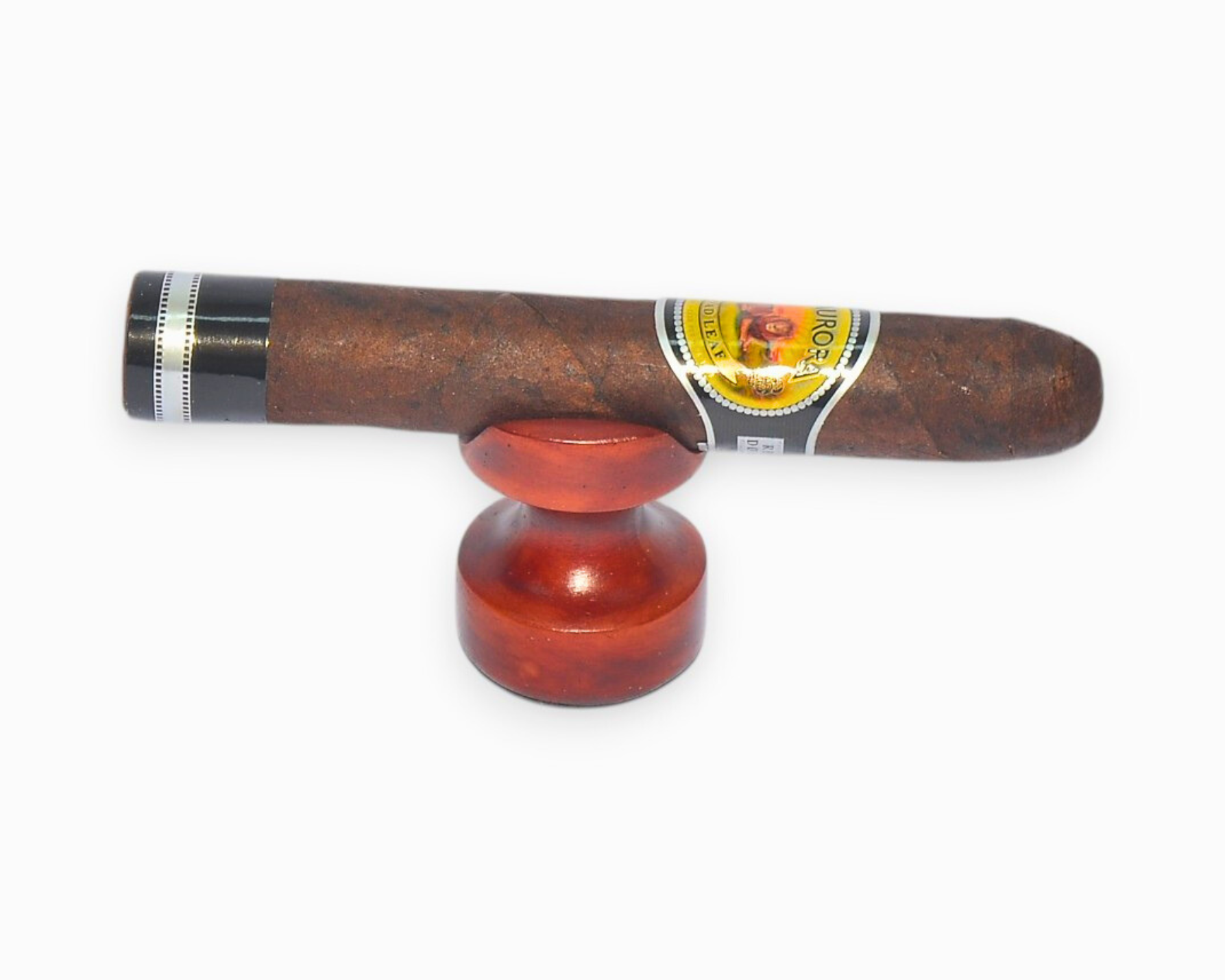 Cigar with a wooden holder on a white background