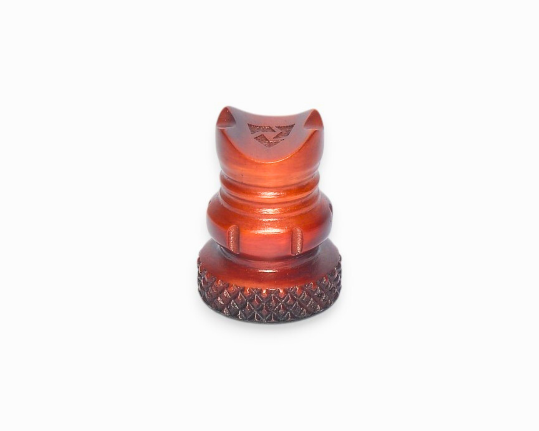 Red metal component with textured base on a white background