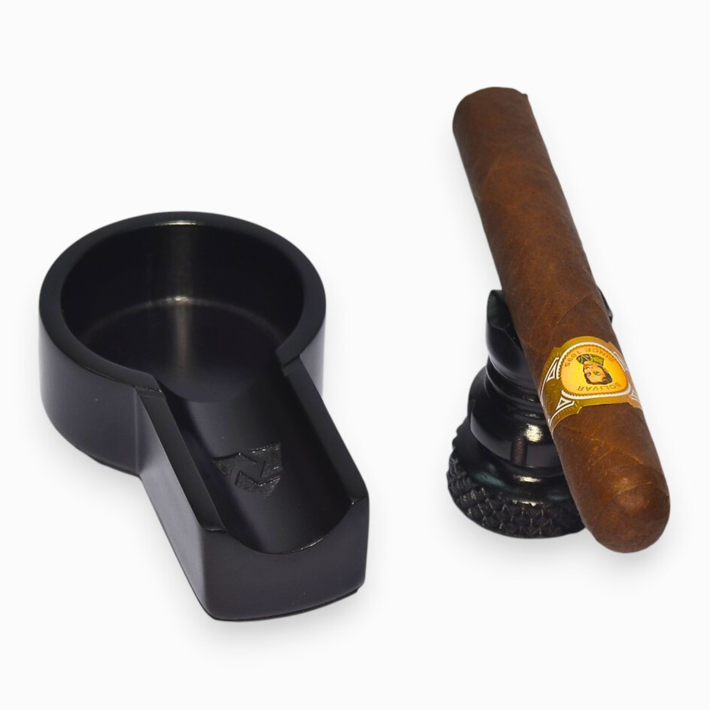 Black cigar holder with a cigar on a white background