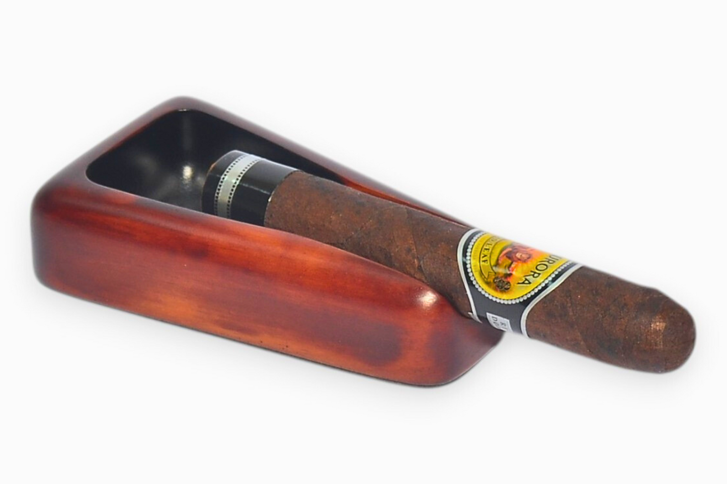 Cigar in a wooden holder with a white background