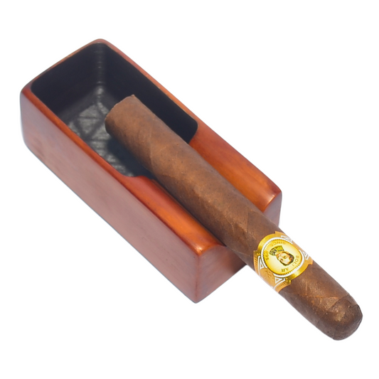 Cigar in a wooden holder with a white background