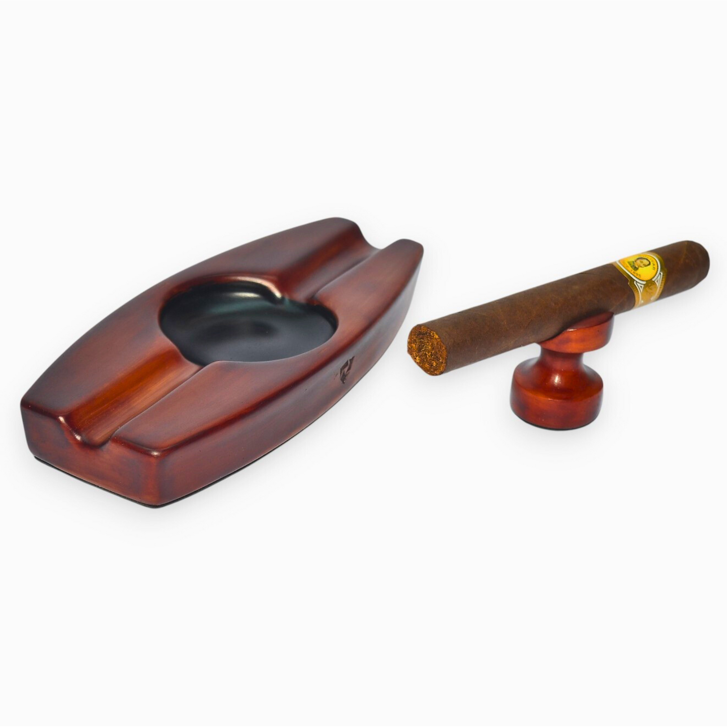 Wooden cigar ashtray with a cigar on a white background