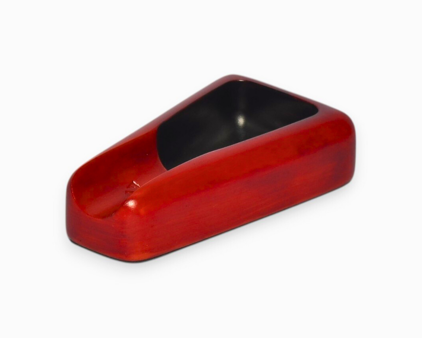 Rectangular red ashtray with a black interior on a white background