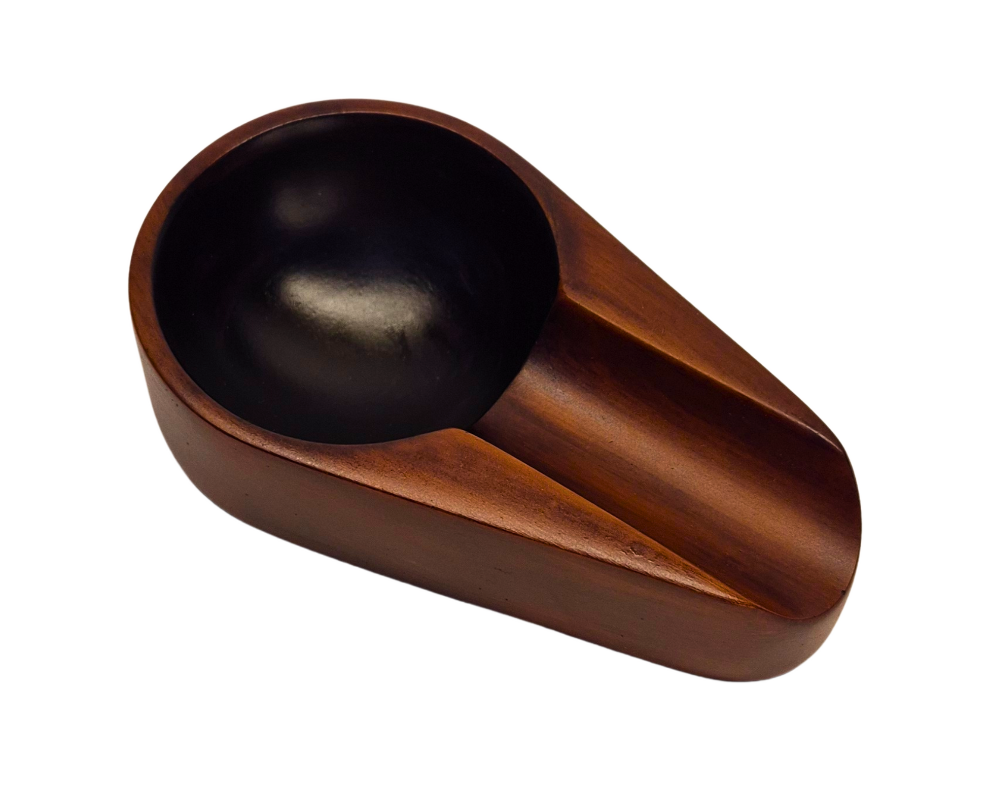 Wooden scoop with black interior on a white background