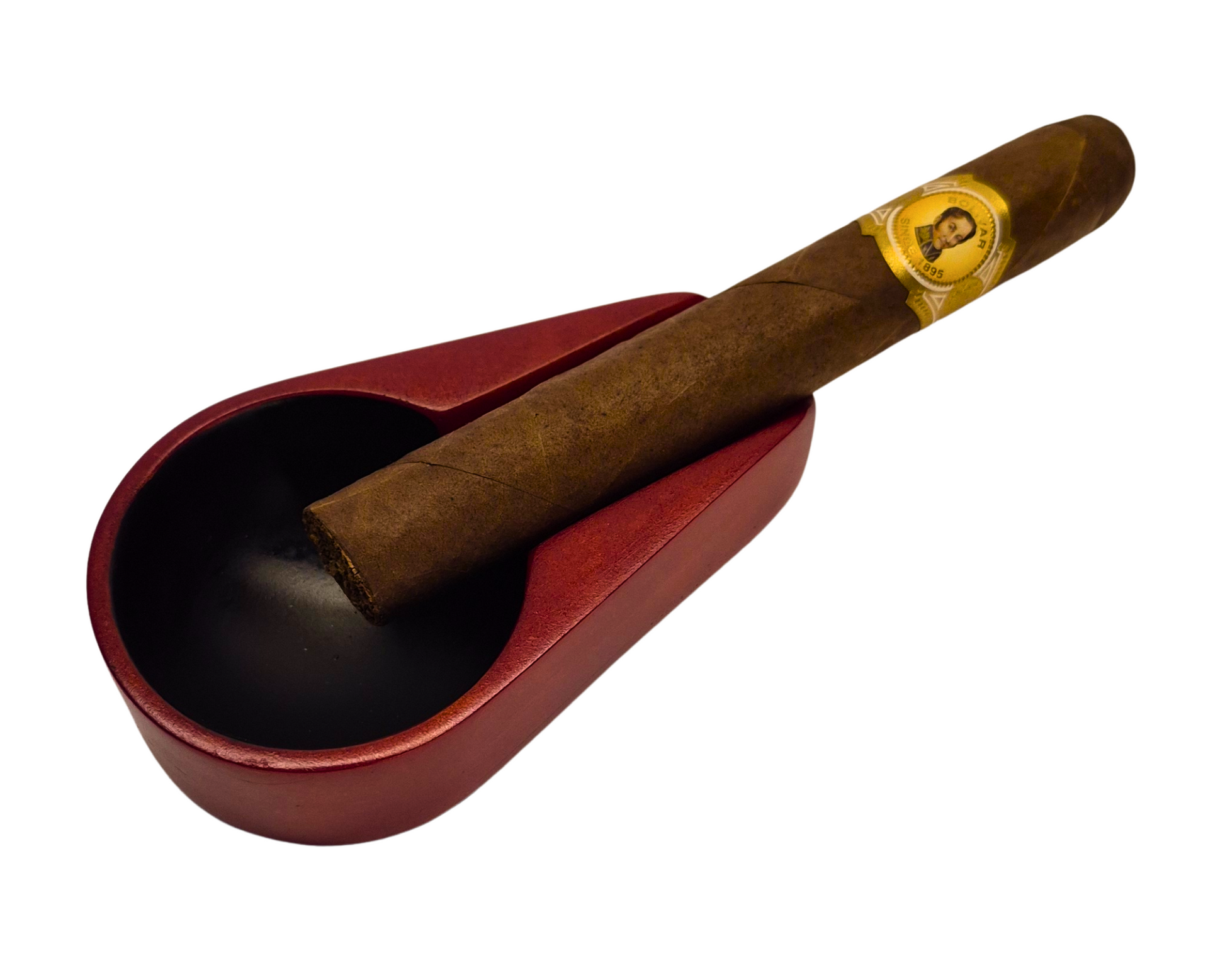 Cigar in a red humidor on a white background