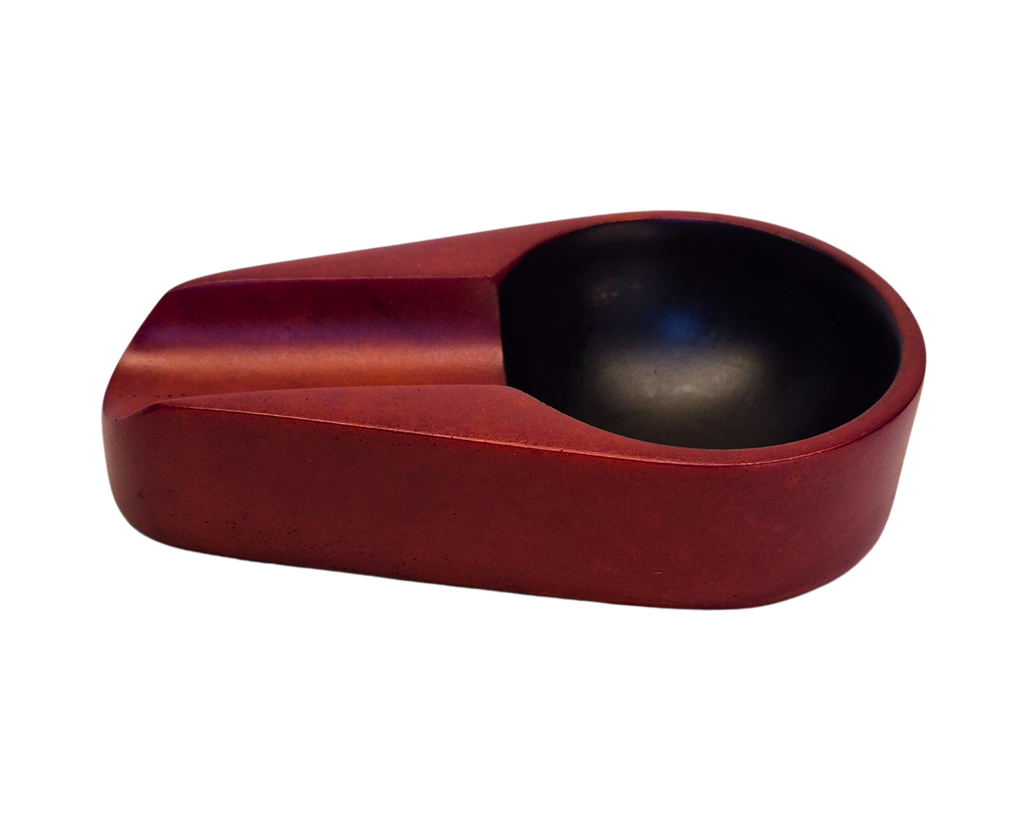 Red and black ceramic bowl on a white background