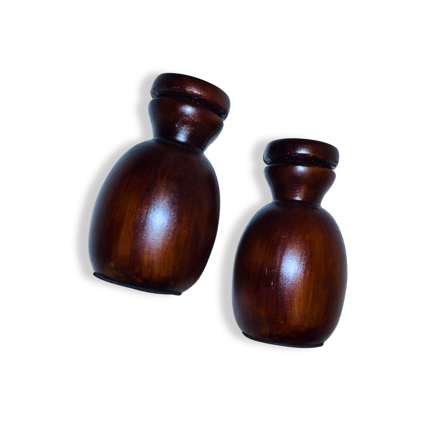 Two wooden bottles on a white background
