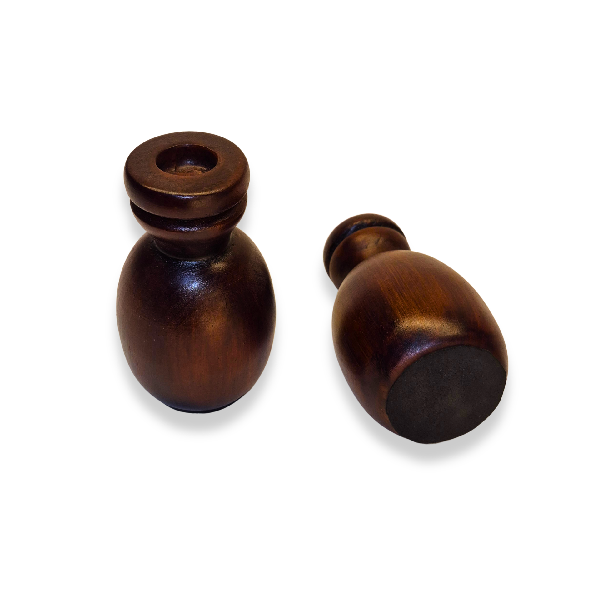 Two wooden knobs on a white background