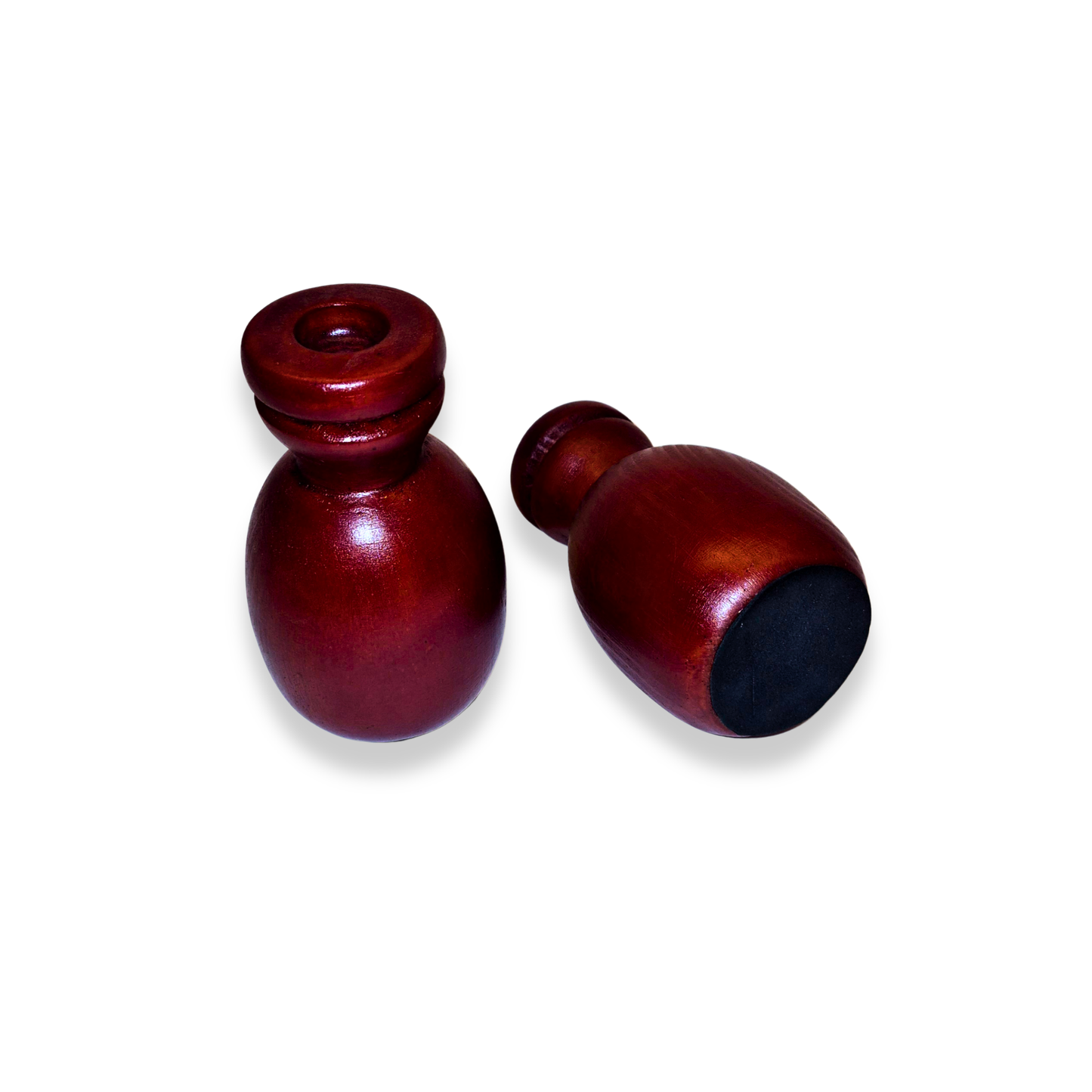 Two wooden bottle stoppers on a white background