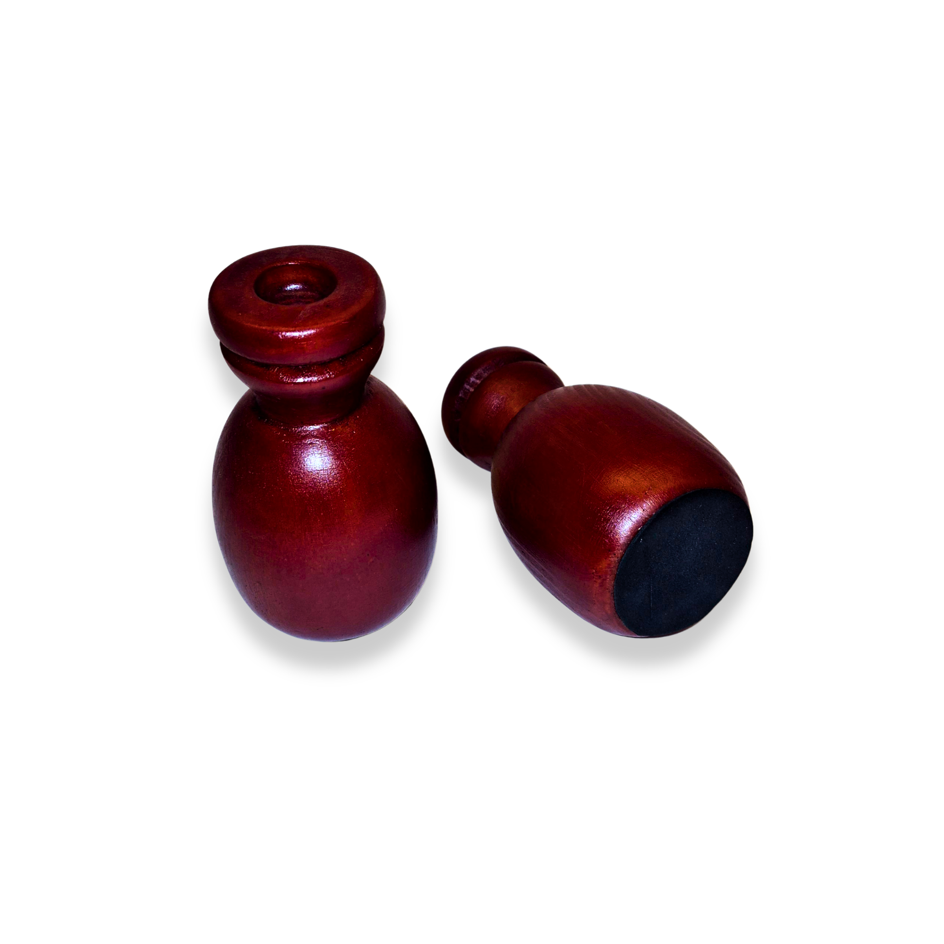 Two wooden bottle stoppers on a white background