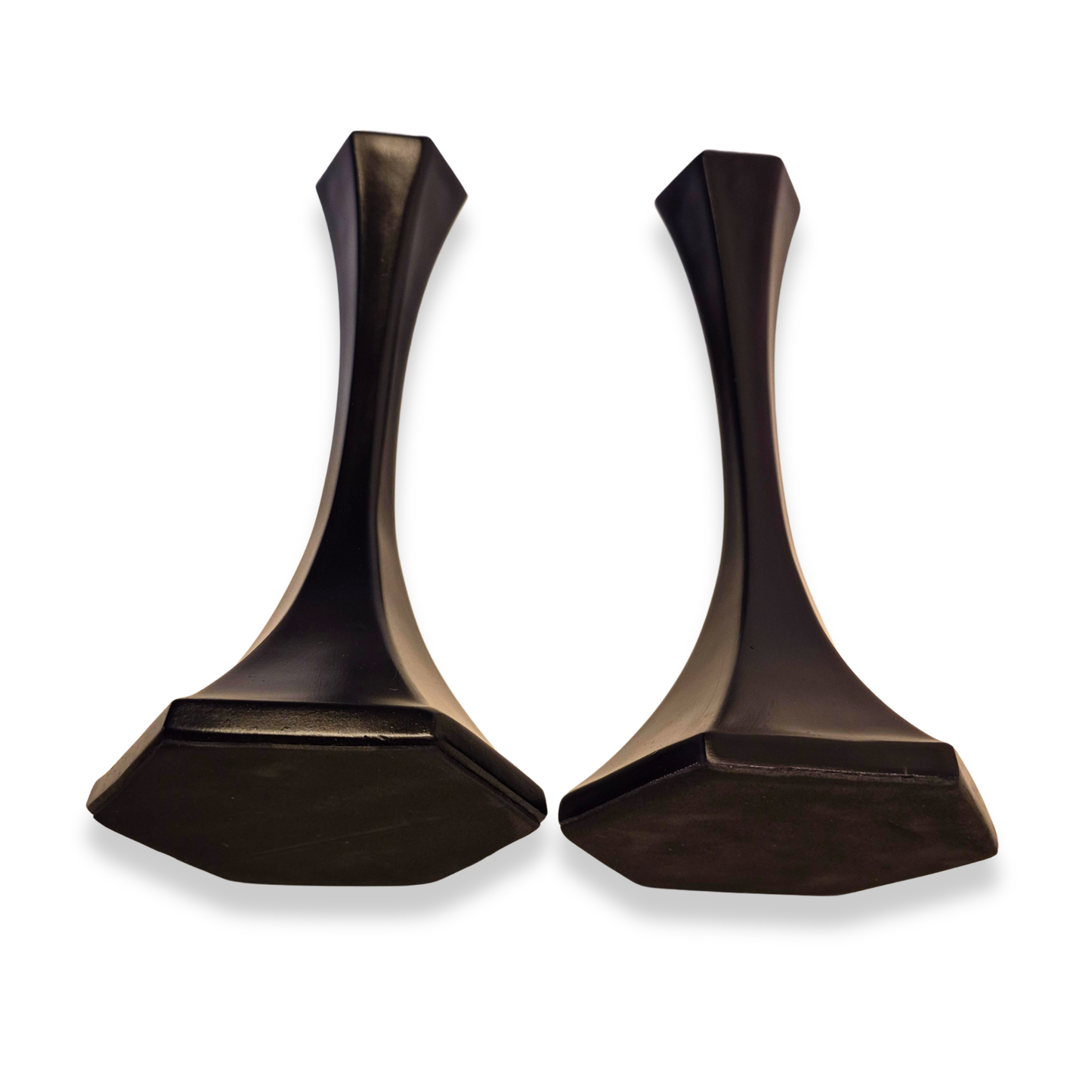 Pair of bronze-colored earrings on a white background