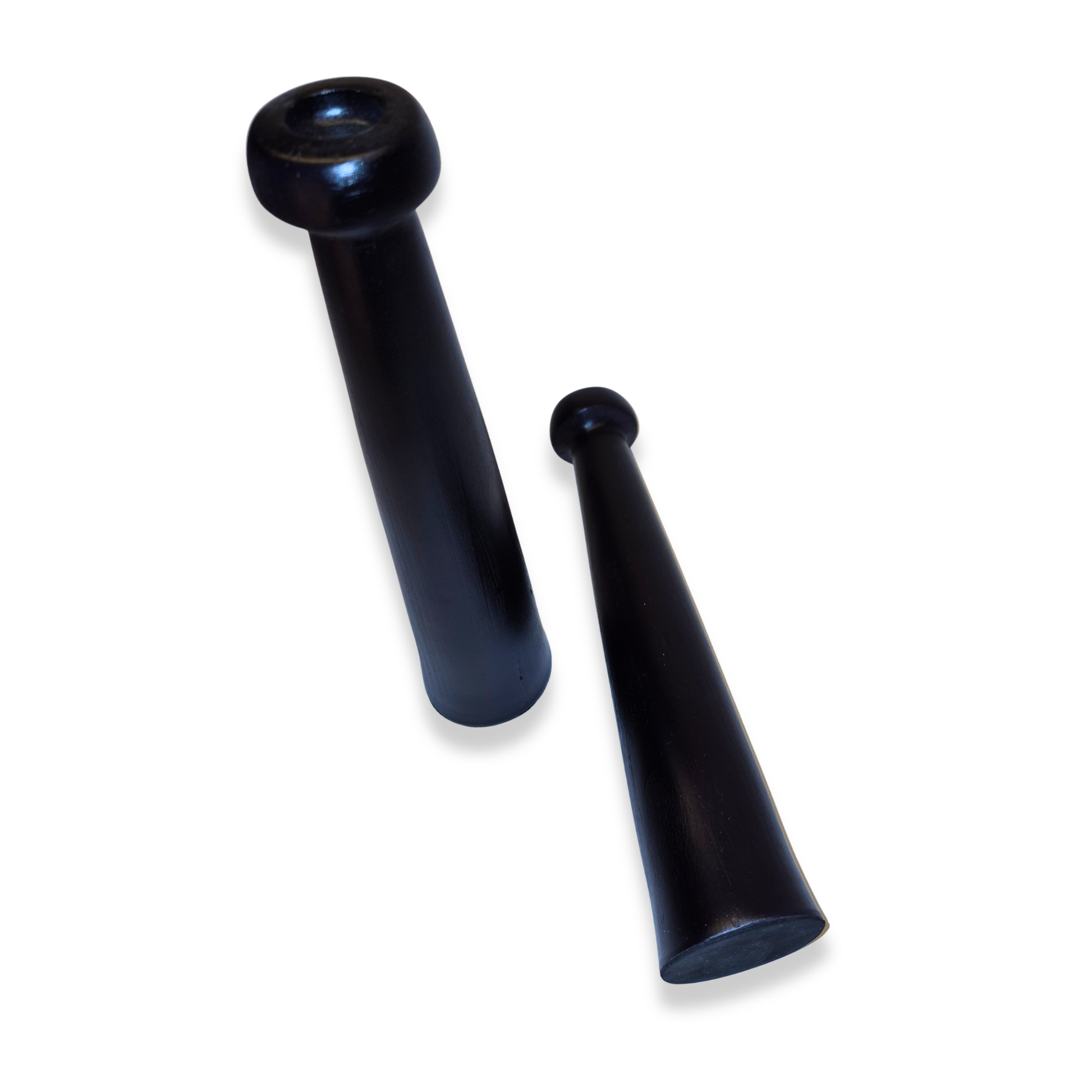 Two black plastic noisemakers on a white background