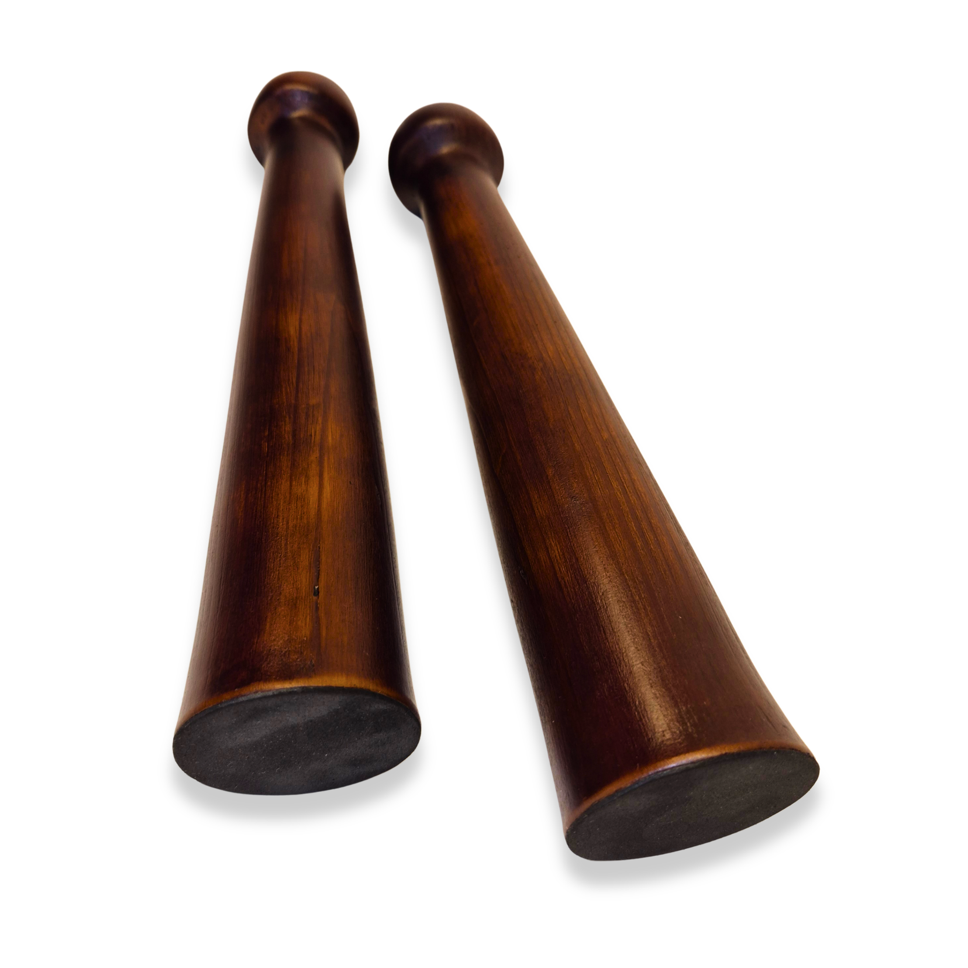 Two wooden candel objects on a white background