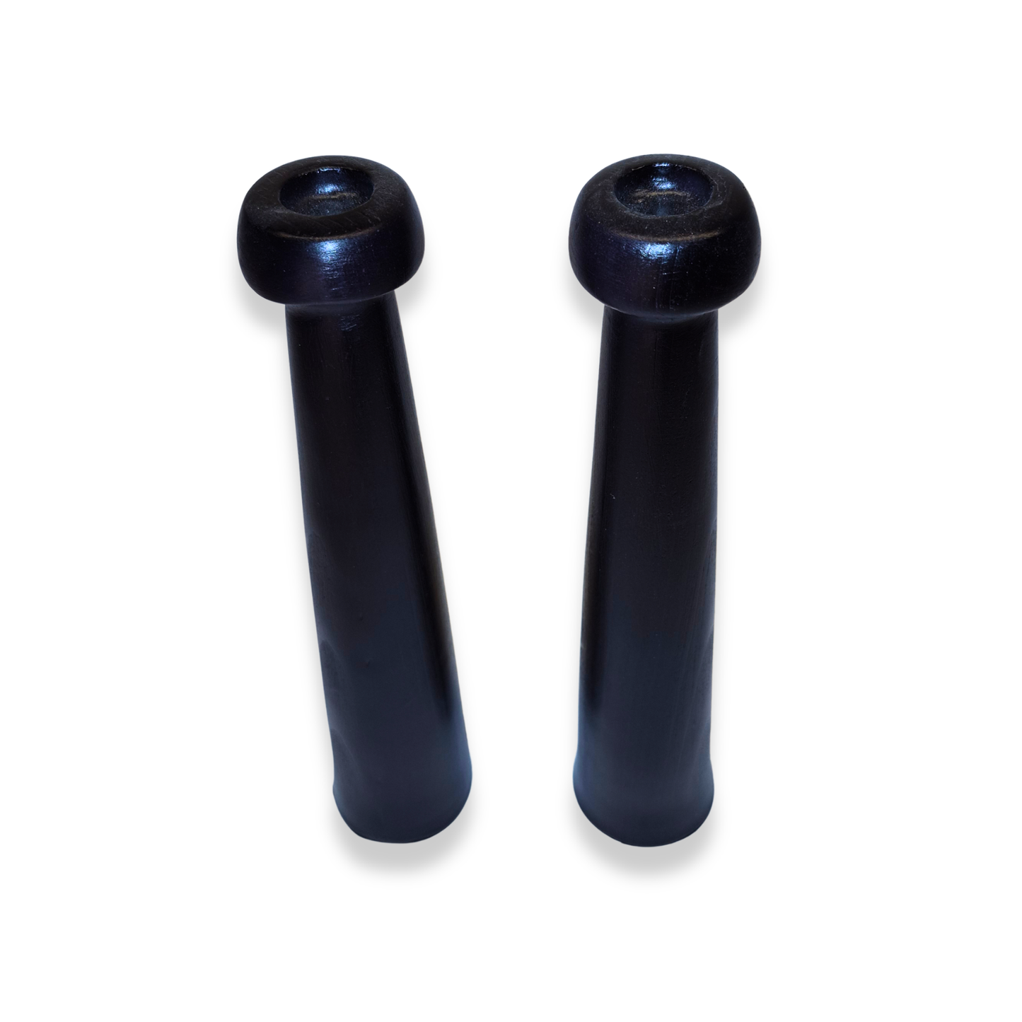 Two black motorcycle handlebar risers on a white background