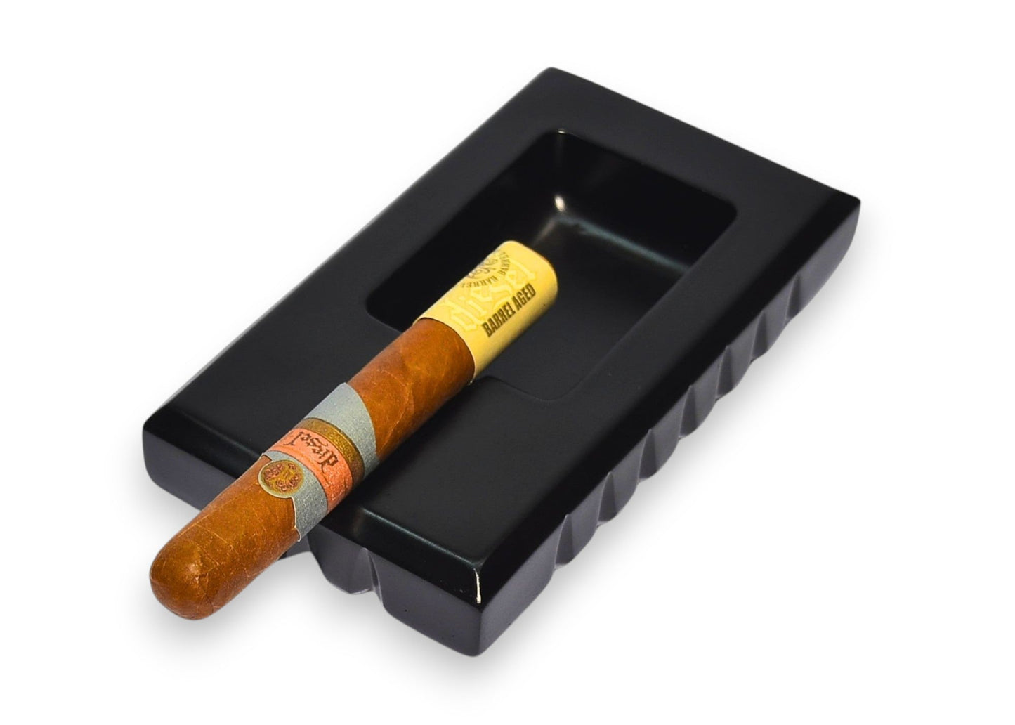 Cigar and ashtray black tray with a white background